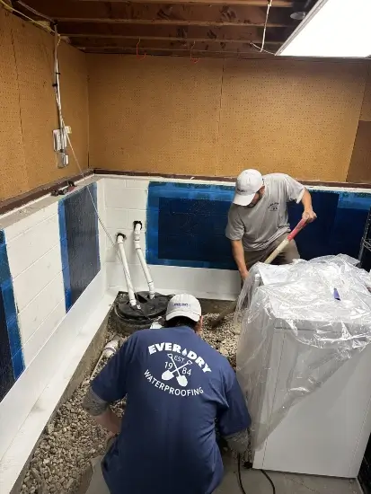 Everdry professionals prepping the basement for waterproofing in Swissvale, PA